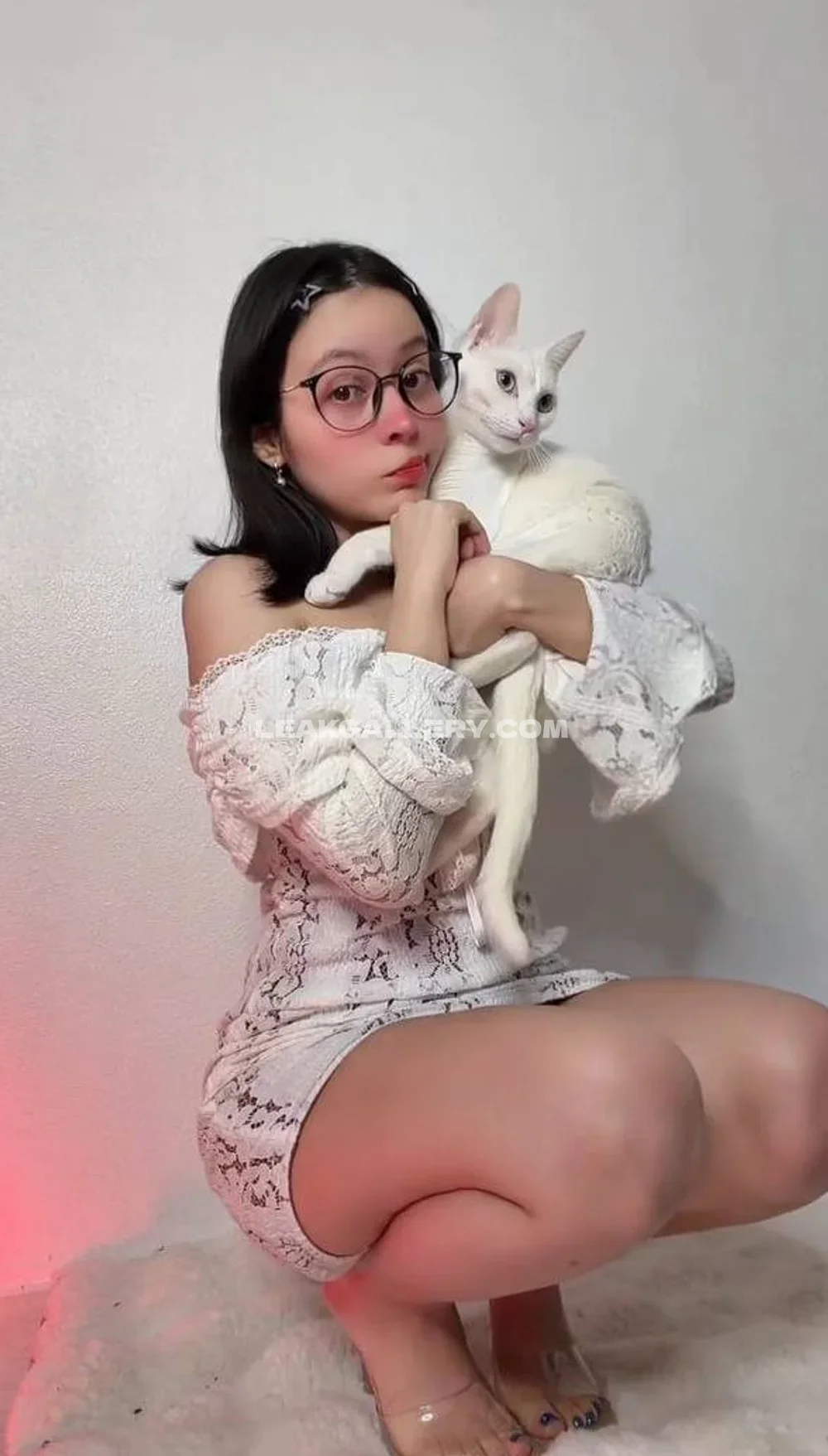 Miniakane_chavez Crouching With White Cat OnlyFans Photo Leaked