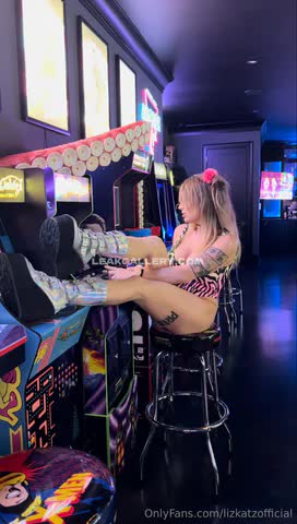 Lizkatzofficial Legs Spread On Arcade Machine OnlyFans Photo Leaked