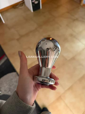 Sara Holding Shiny Metal Toy OnlyFans Photo Leaked