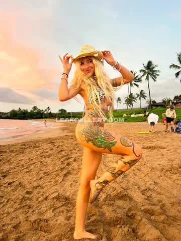Sensualsunshine Tattooed Legs Beach Pose OnlyFans Photo Leaked